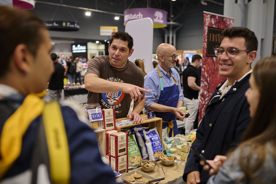 Exhibitor Giving Out Samples on the Show Floor of the Fancy Food Show