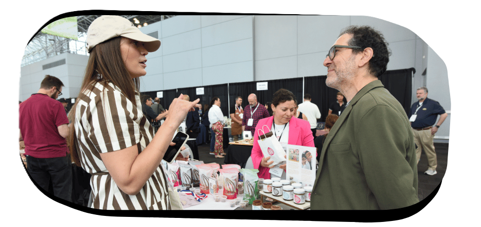 exhibitors gathered around their products