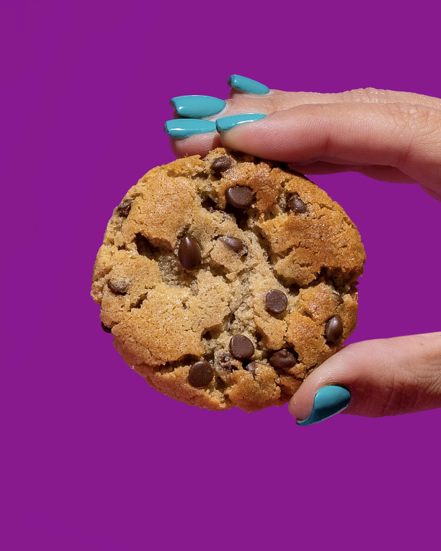 Image of hand holding Whoa Dough cookie