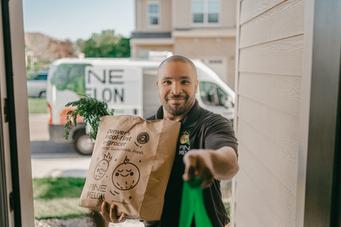 PineMelon courier delivering groceries