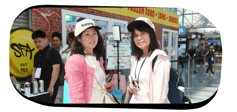 Exhibitors smiling together