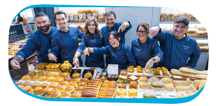 exhibitors gathered around their products