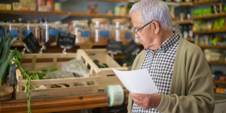 Senior citizen shopping for groceries.
